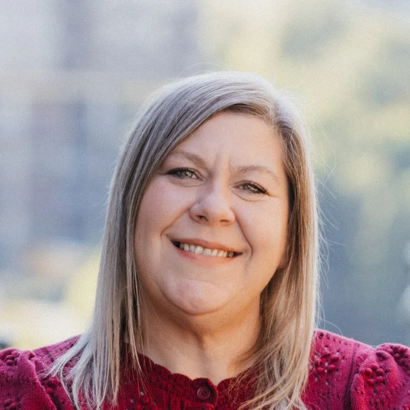 Heather Seat, CPA, smiling outdoors